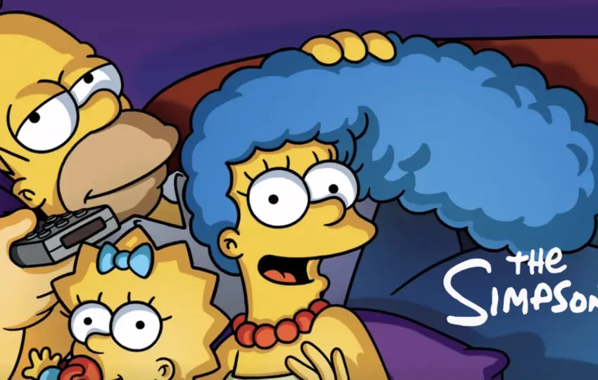 Ο Homer Simpson κρατά μια ροζ ντόνατ που σχηματίζει τον αριθμό 2, teaser πόστερ για το Simpsons Movie 2»