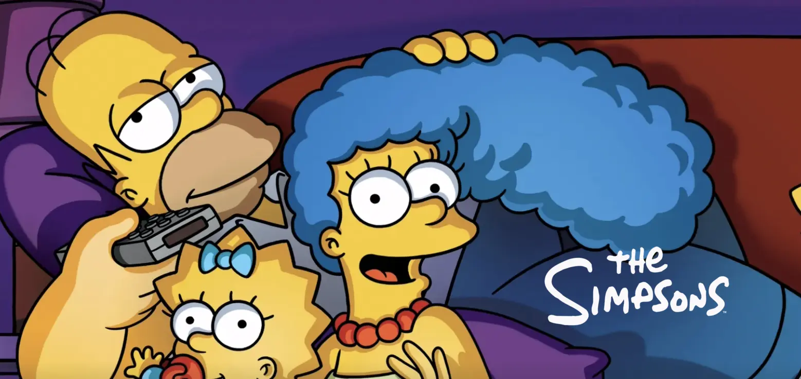 Ο Homer Simpson κρατά μια ροζ ντόνατ που σχηματίζει τον αριθμό 2, teaser πόστερ για το Simpsons Movie 2»